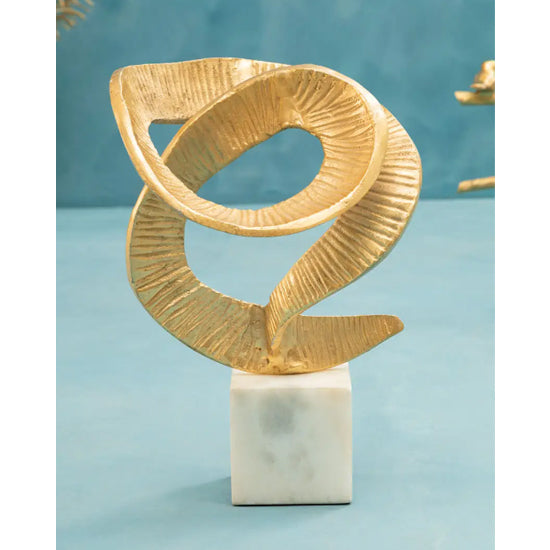 Evra Sculpture In Gold With White Marble Base