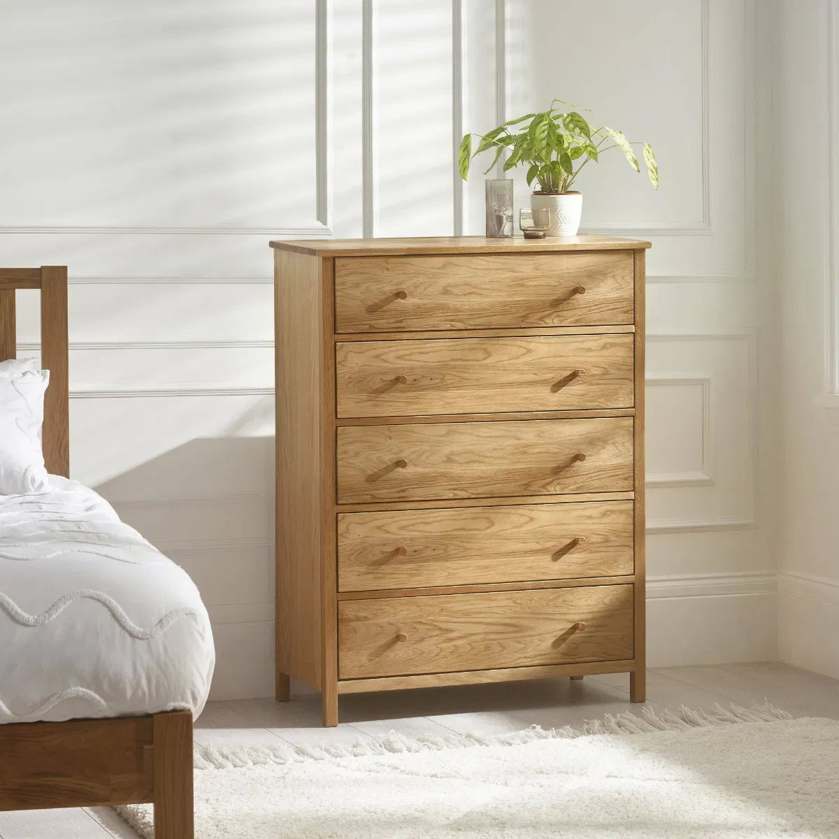 Coxmoor Wide Wooden Chest Of 5 Drawers In Oak
