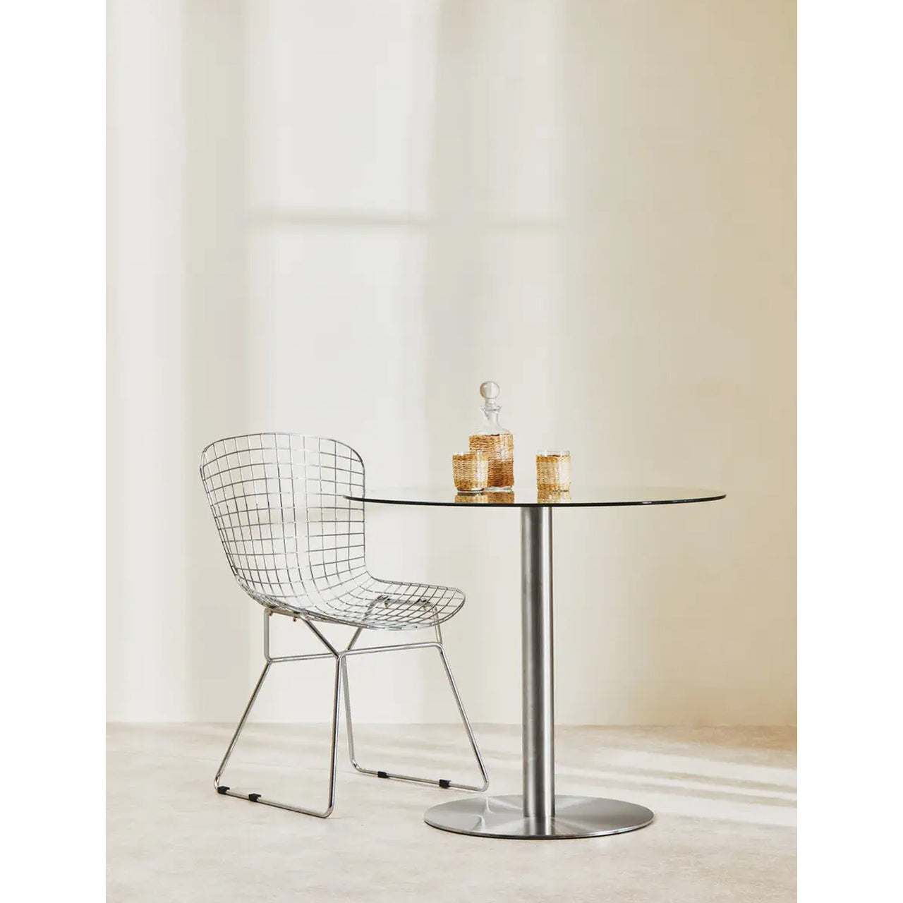 Metropolitan Round Clear Glass Dining Table With Silver Steel Base