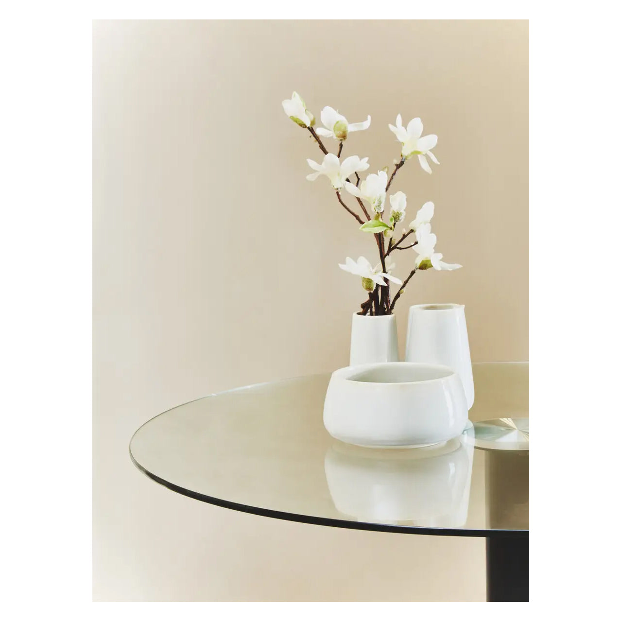 Metropolitan Round Clear Glass Dining Table With Matt Black Steel Base