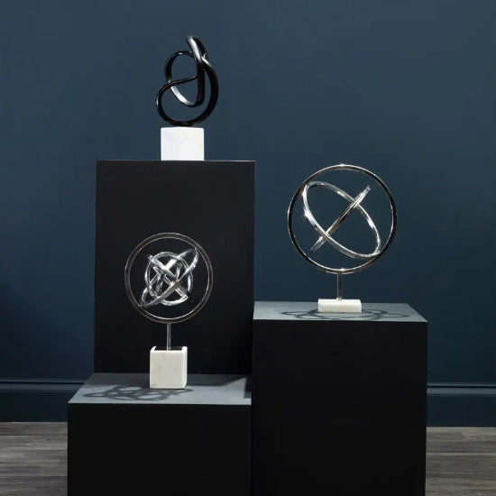 Mirano Steel Spiral Sculpture in Polished Silver With White Marble Base