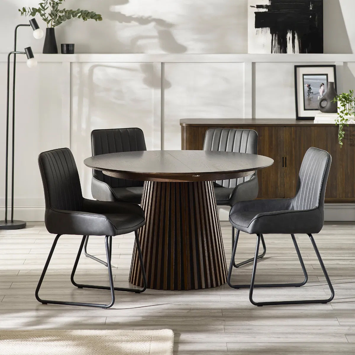 Arya Extending Round Wooden Dining Table In Rich Dark Oak Effect