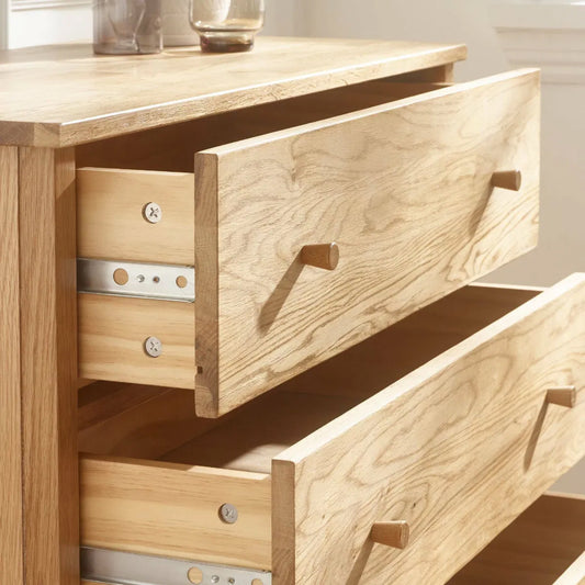 Coxmoor Wide Wooden Chest Of 5 Drawers In Oak